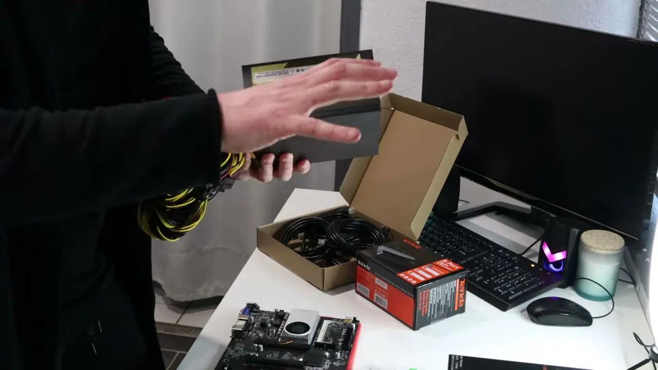 Présentation détaillée des composants du rig : carte mère, alimentation, GPU